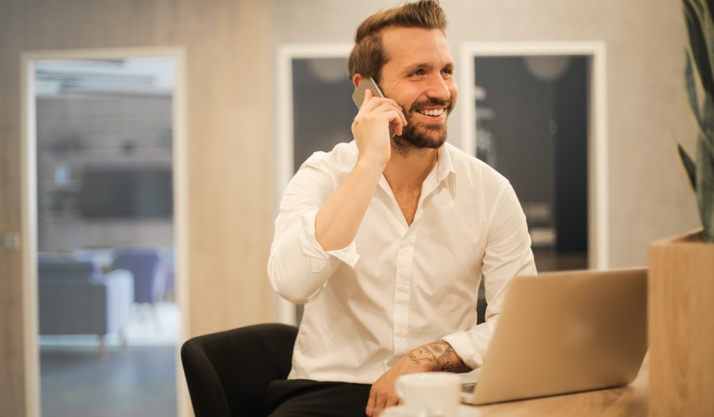 Businessman having an interesting phone call