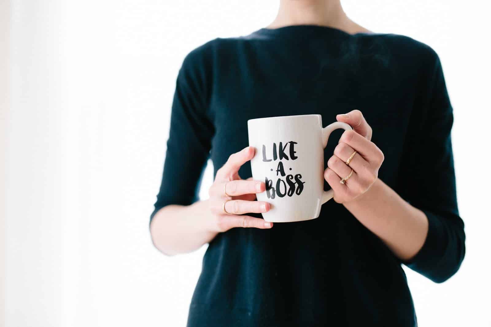 Woman Holding a Mug