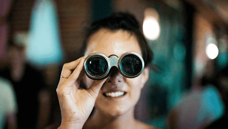 Woman Using a Telescope